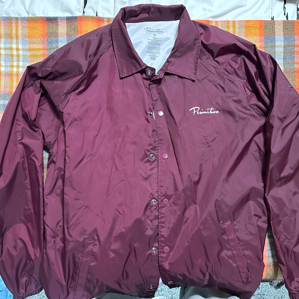 Primitive maroon windbreaker